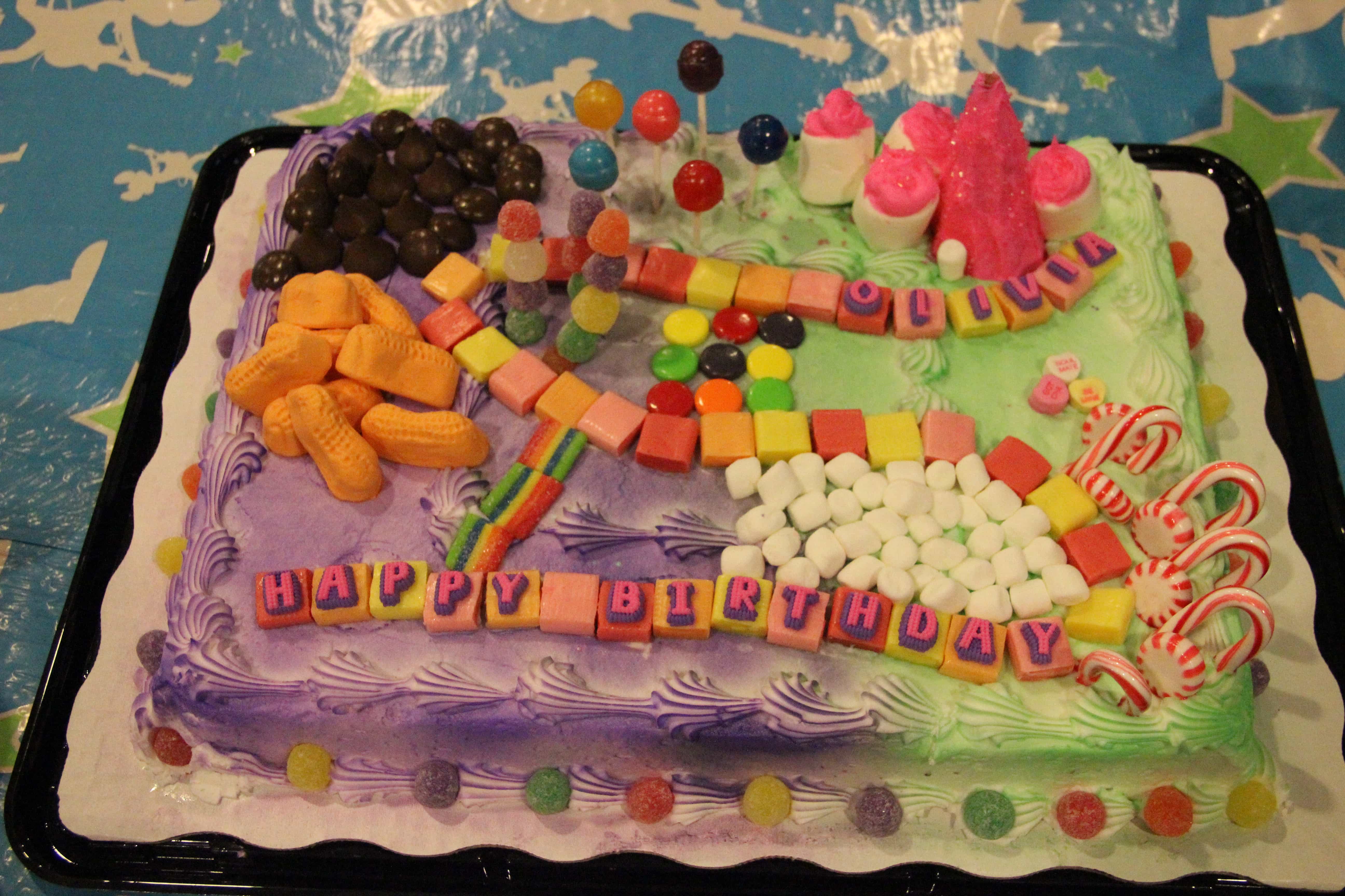 41 First Birthday Cake Ideas to Celebrate Milestone Moments : Candyland Cake