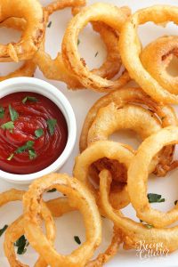 Beer Battered Onion Rings - Homemade beer battered onion rings are super easy!!  Plus, they only take a few ingredients to whip up at home!