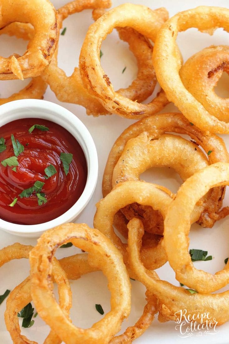 https://www.diaryofarecipecollector.com/wp-content/uploads/2021/07/beer-battered-onion-rings-3-735x1103.jpeg