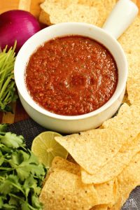 Easy Blender Salsa Recipe - This restaurant-style salsa recipe is so quick and easy and only takes 10 minutes to make!