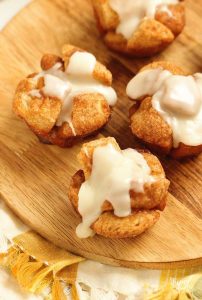 Mini Monkey Bread Muffins are a fun breakfast treat idea. They are easy to throw together and bake up quicker than traditional monkey bread!