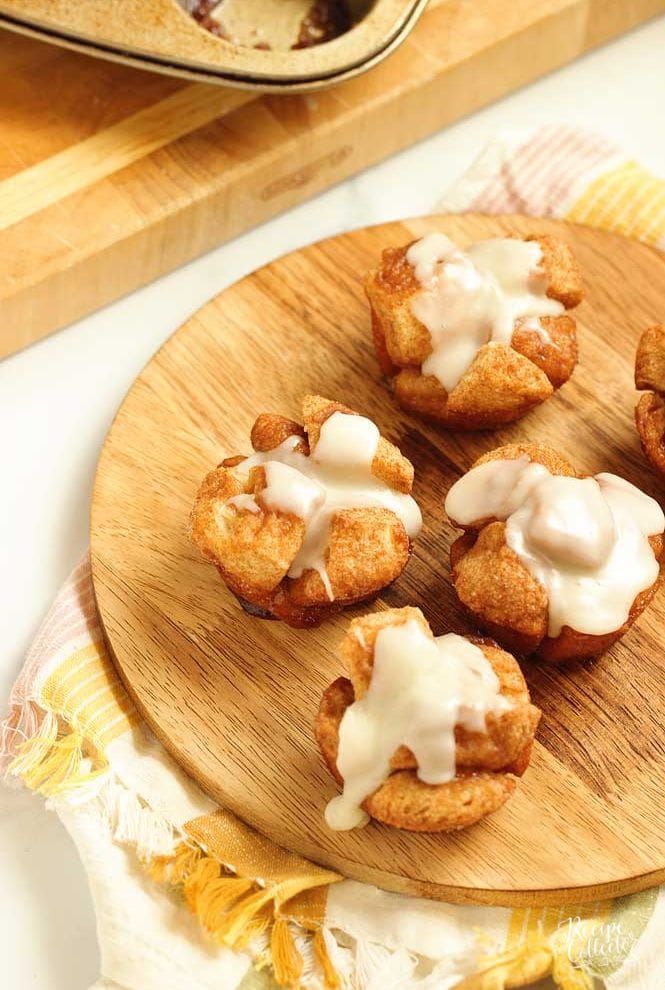 Mini Monkey Bread Muffins are a fun breakfast treat idea. They are easy to throw together and bake up quicker than traditional monkey bread!