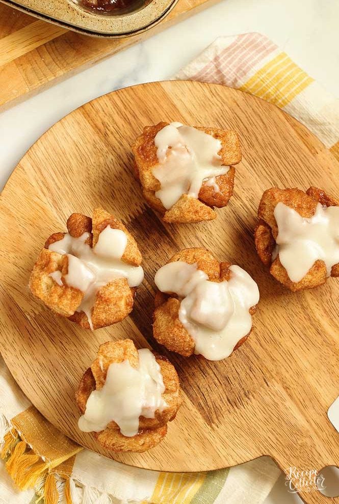 Mini Monkey Bread Muffins are a fun breakfast treat idea. They are easy to throw together and bake up quicker than traditional monkey bread!