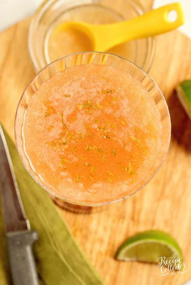 Pink Sunrise Cocktail - A lovely blend of vodka, aperol, Coco Lopez, pineapple juice, and lime zest! It's a perfect summer drink!