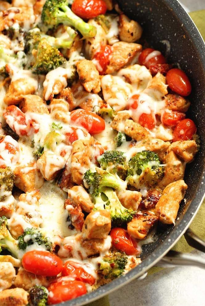 Low-Carb Tuscan Chicken - An easy low-carb healthy one pan dish filled with chicken breasts, broccoli, grape tomatoes, sun-dried tomatoes, spices, and a creamy light sauce and topped with cheese. It's great for meal prep too!